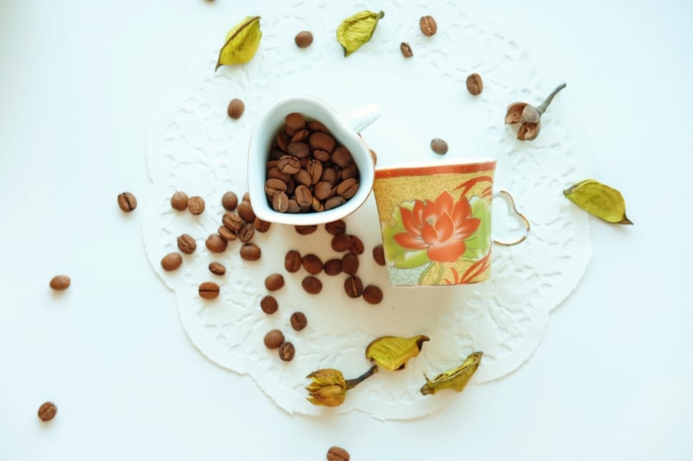glass bowl with heart ceramic mug with coffee beans preview