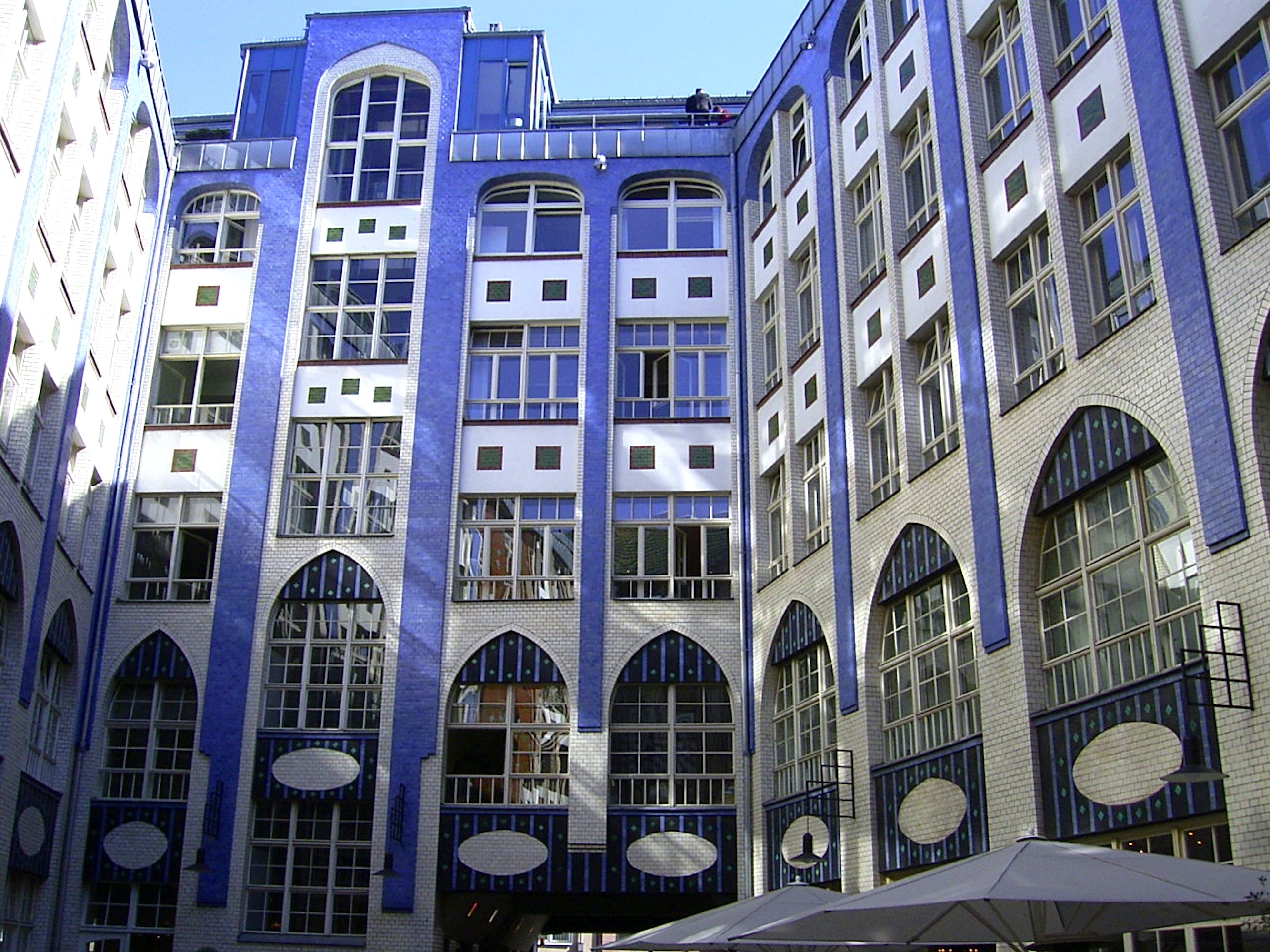 blue and white concrete building during daytime