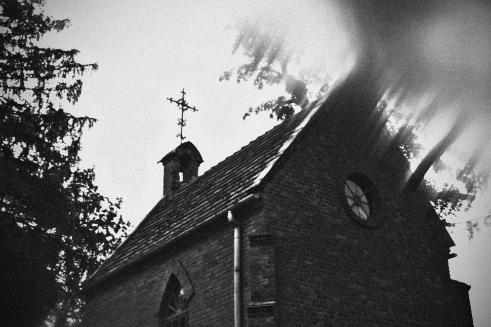 grayscale photography of concrete church preview