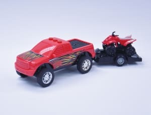 red rc toy truck and atv quad bike thumbnail