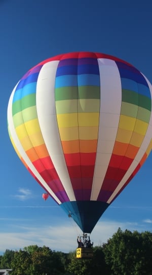 white red yellow and blue hot air balloon thumbnail